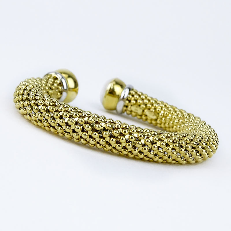 Italian 14 Karat Yellow Gold Flexible Cuff Bangle with Mabe Pearl and Diamond Accents.