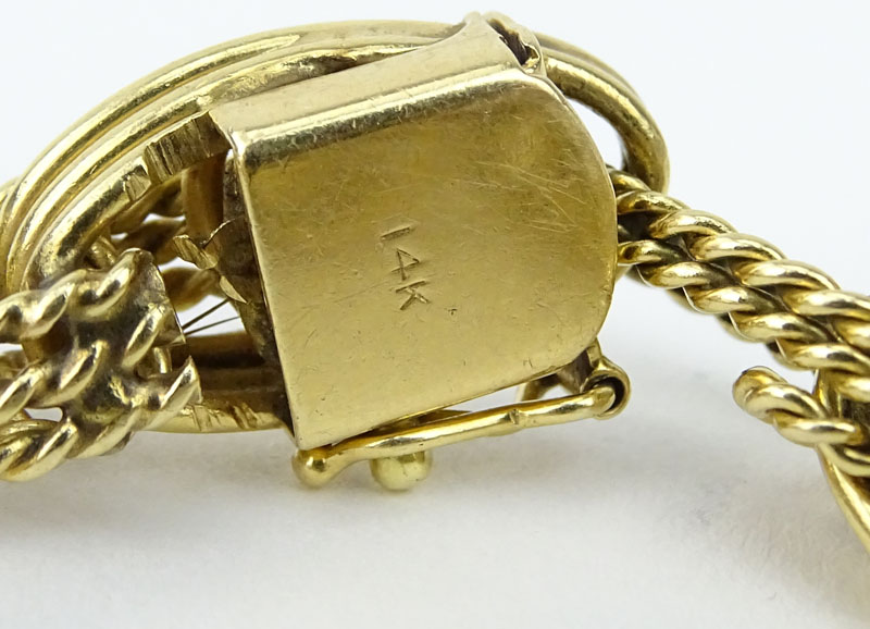 Vintage 14 Karat Yellow Gold Charm Bracelet. Signed 14K.