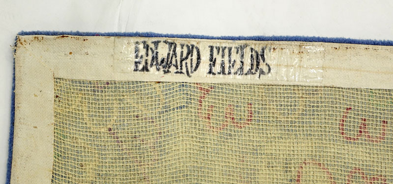 Edward Fields Colorful Floral Wool Rug. Signed en verso of the border.