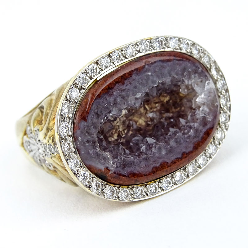 Vintage 14 Karat Yellow Gold, .70 Carat Round Brilliant Cut Diamond and Red Quartz Ring. 