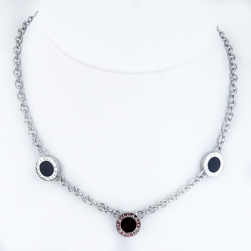 Bulgari Approx. .60 Carat Diamond, Onyx and 18 Karat White Gold Reversible Three (3) Circle Necklace. 