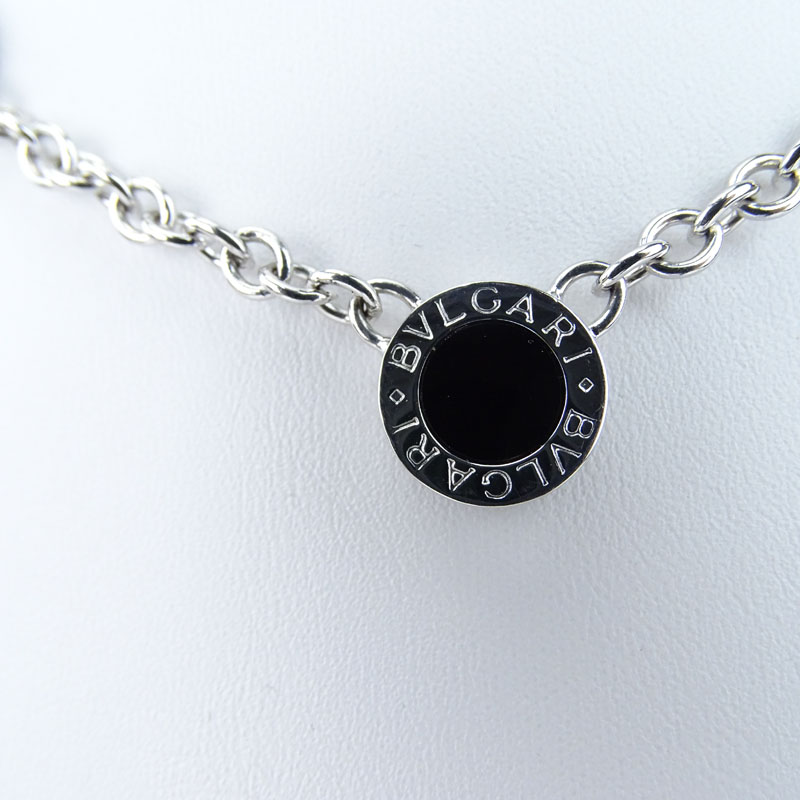 Bulgari Approx. .60 Carat Diamond, Onyx and 18 Karat White Gold Reversible Three (3) Circle Necklace. 