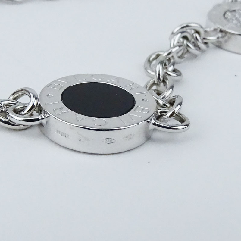 Bulgari Approx. .60 Carat Diamond, Onyx and 18 Karat White Gold Reversible Three (3) Circle Necklace. 