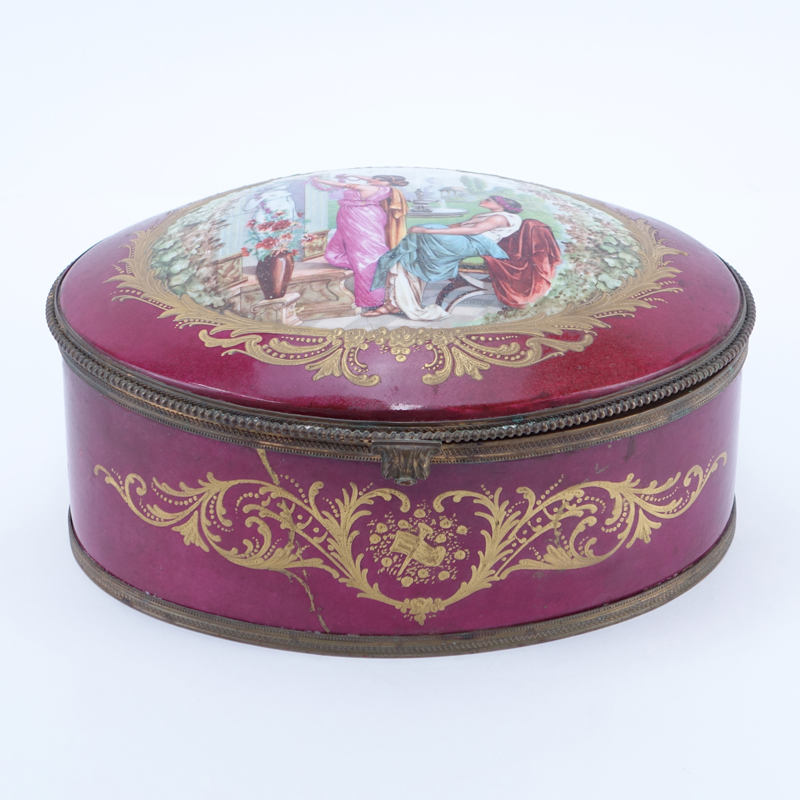 Large Sevres Porcelain Box. Boasts a transferred classical scene on lid. Sevres mark on bottom.