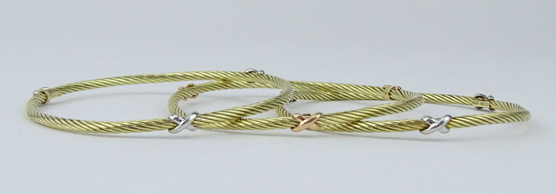 Three (3) David Yurman 14 Karat Yellow Gold Bangle Bracelets.