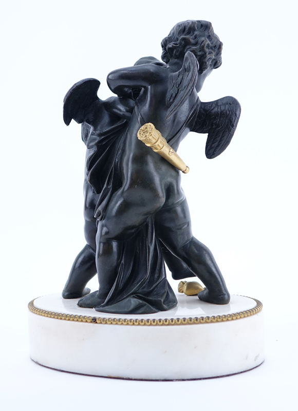 A French Bronze Group Of Two Putti Fighting Over A Heart. After: Pigalle, 19th C. Unsigned. 