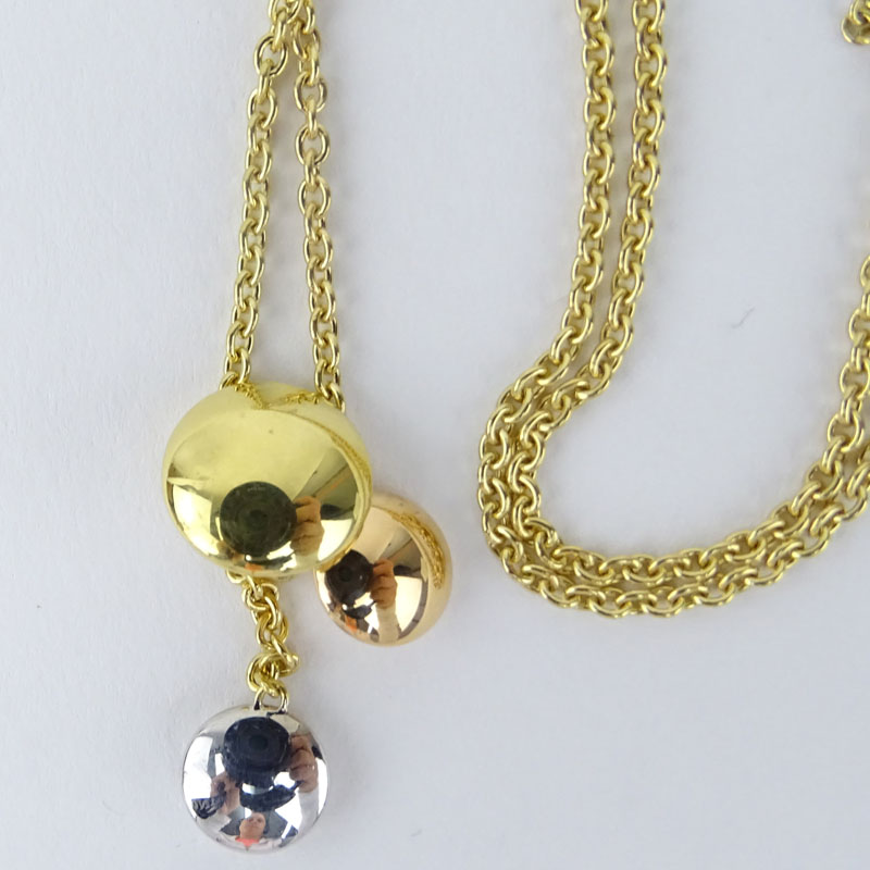 Cartier 18K Tri-Color Gold Triple Graduated Discs Drop Pendant Necklace.