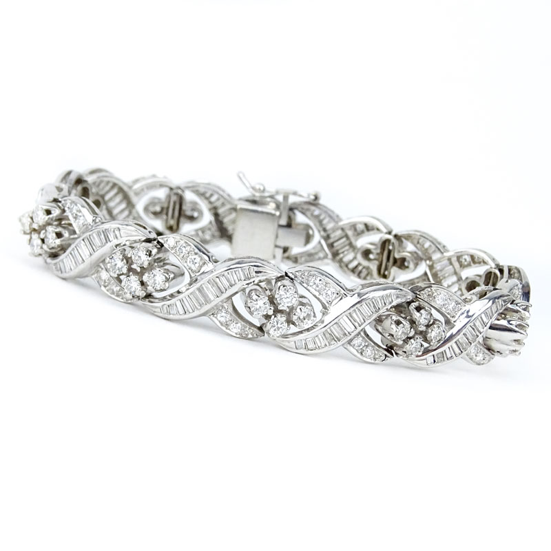 Retro Lady's Round Brilliant Cut and Baguette Diamond and Platinum Bracelet.