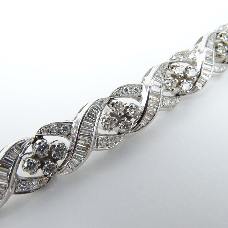 Retro Lady's Round Brilliant Cut and Baguette Diamond and Platinum Bracelet.