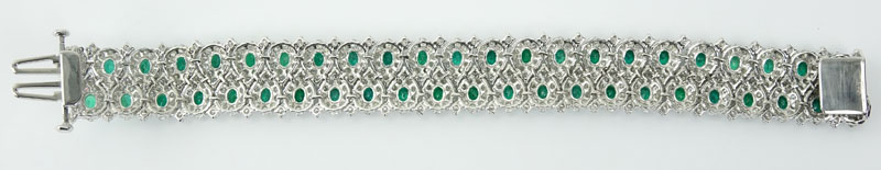 Elegant Raymond C. Yard Approx. 17.0-18.0 Carat Forty Six (46) Oval Brilliant Cut Emerald,  14.0-15.0 Carat Round Brilliant Cut Diamond and Platinum Bracelet. 