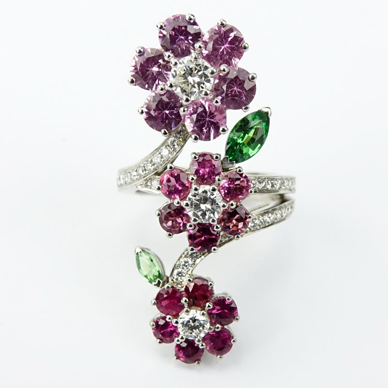 Fine Van Cleef & Arpels 18 Karat White Gold Diamond Pink Sapphire and Tsavorite Garnet Flower Ring.