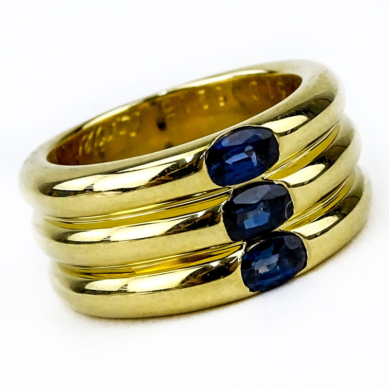 Cartier Approx. 1.10 Carat Oval Cut Sapphire and  18 Karat Yellow Gold 10mm Triple Stack Band Ring.