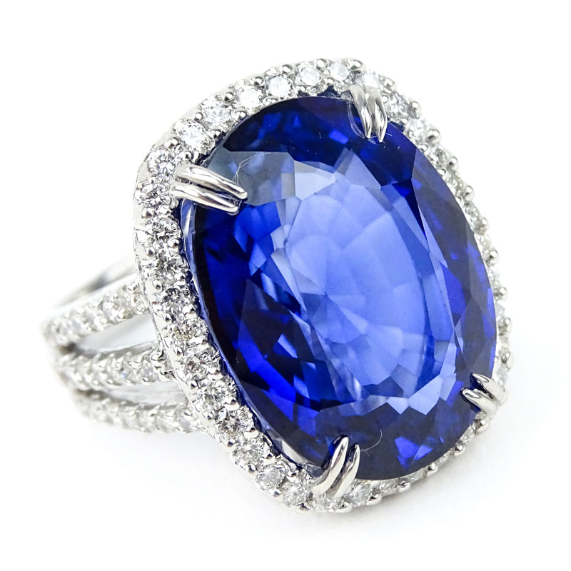 24.14 Carat Oval Cut Royal Blue Sapphire, 2.08 Carat Round Brilliant Cut Diamond and 18 Karat White Gold Ring. 