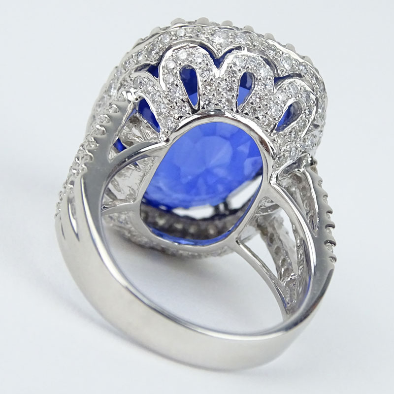 24.14 Carat Oval Cut Royal Blue Sapphire, 2.08 Carat Round Brilliant Cut Diamond and 18 Karat White Gold Ring. 
