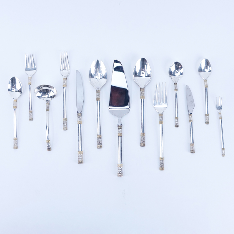 Ninety-Four (94) Piece Wallace Golden Aegean Weave Sterling Silver Flatware Set.