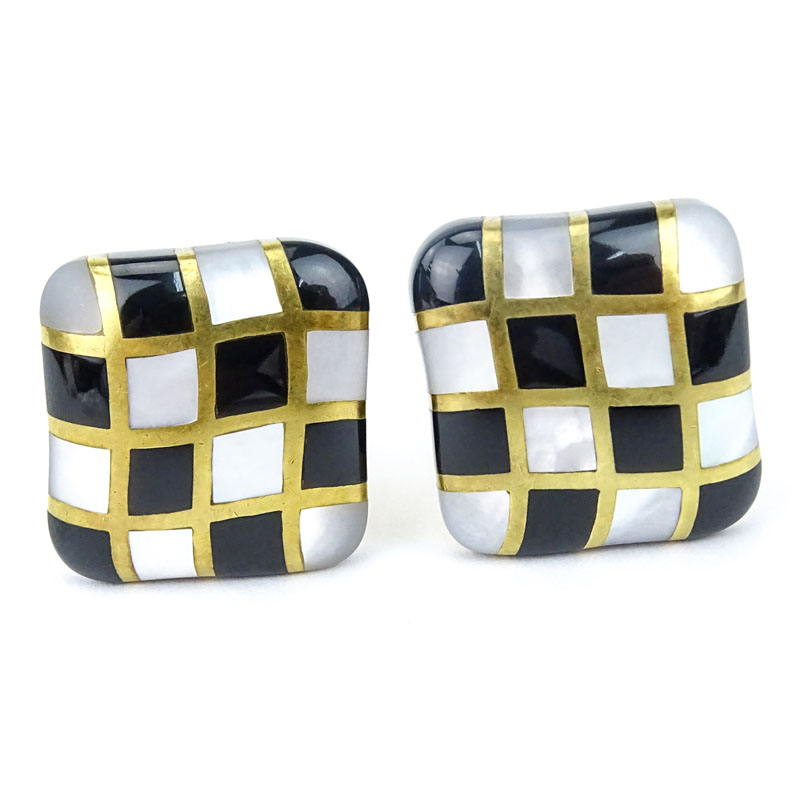 Circa 1984 Angela Cummings 18 Karat Yellow Gold, Mother of Pearl and Black Onyx Earrings.