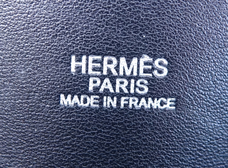 Hermès Black Ardennes Bolide 37 Bag. Palladium hardware, clochette, zipper closure, optional shoulder strap, slot pocket on interior.