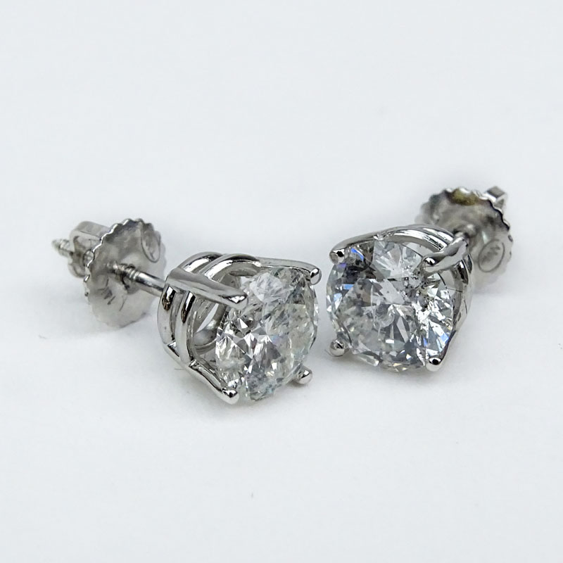 Approx. 2.06 Carat Round Brilliant Cut Diamond and 14 Karat White Gold Diamond Ear Studs.