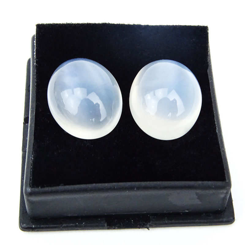 Two (2) Gem Quality Oval Cabochon Moonstones, Approx. 20.80 Carats TW. Very strong cat's eye effect, VVS1 clarity. 