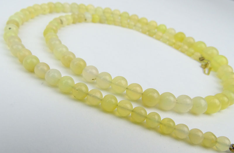 Vintage Approx. 45.0 Carat Ninety Two (92) Ethiopian White Opal Round Bead Necklace with 14 Karat Yellow Gold Clasp.