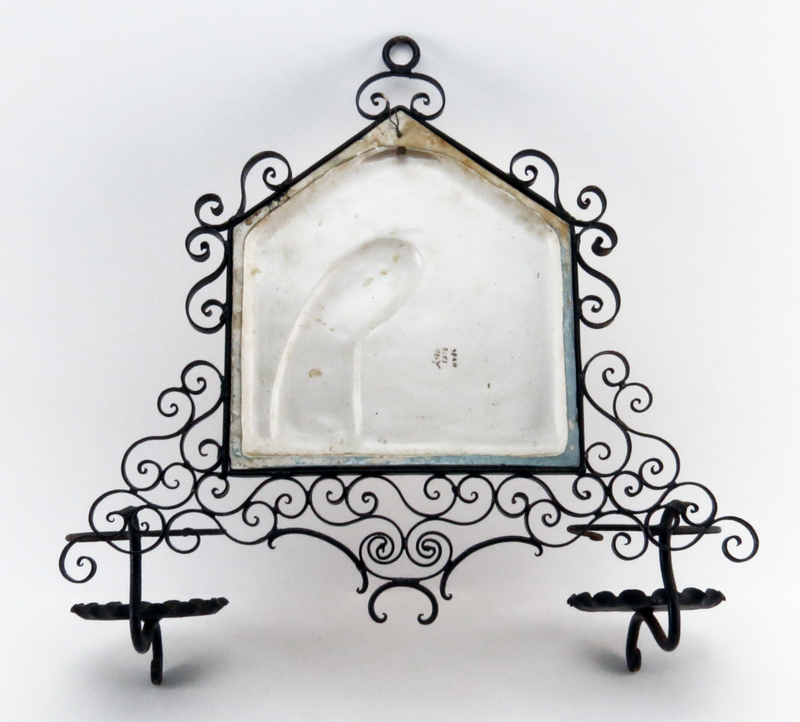 Mid Century Italian Iron Sconce with Relief Pottery Plaque.