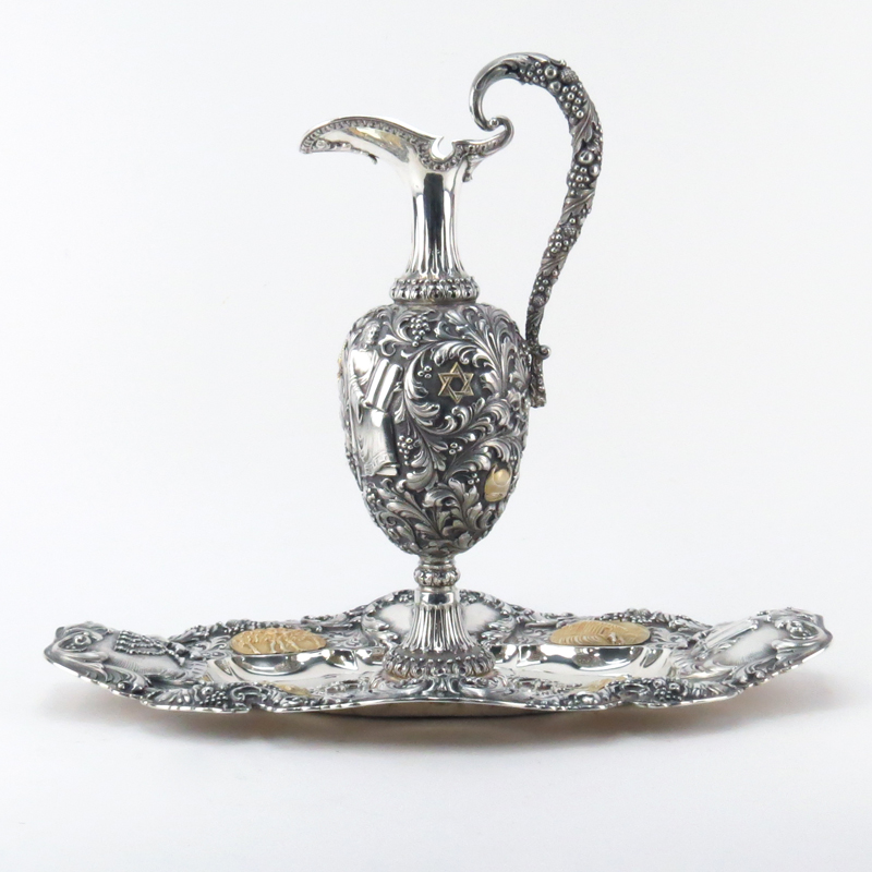 Fine Judaica Silver Ewer and Tray. Decorated with various Judaica symbols e.g. Menorah, Hamsa, Torah, Torah Shield etc. 