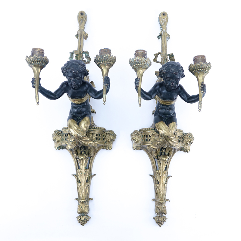 Pair of 19/20th Century Louis XVI Style Gilt Bronze Putti Figural Wall Sconces.