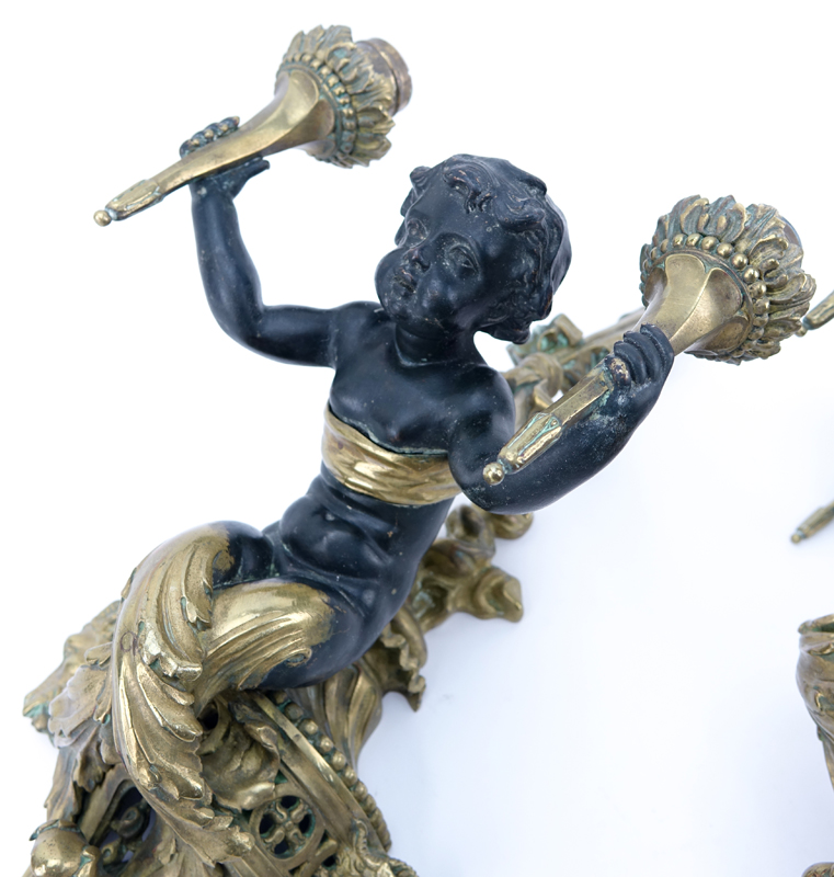 Pair of 19/20th Century Louis XVI Style Gilt Bronze Putti Figural Wall Sconces.