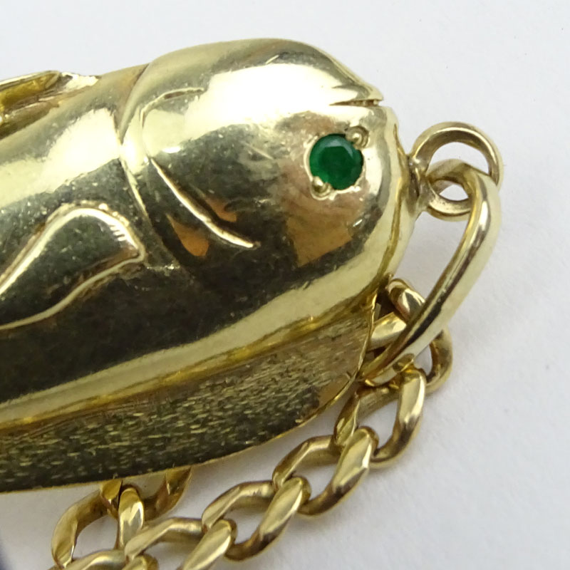 Vintage Heavy 14 Karat Yellow Gold Fish Pendant Necklace with Emerald Accents.