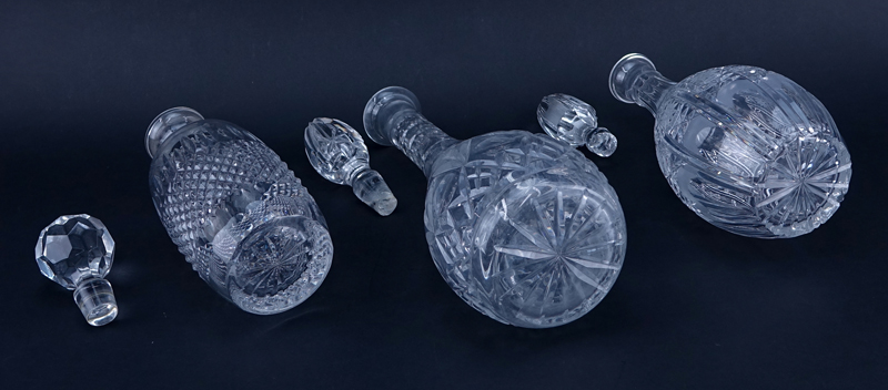 Three (3) Crystal Decanters.