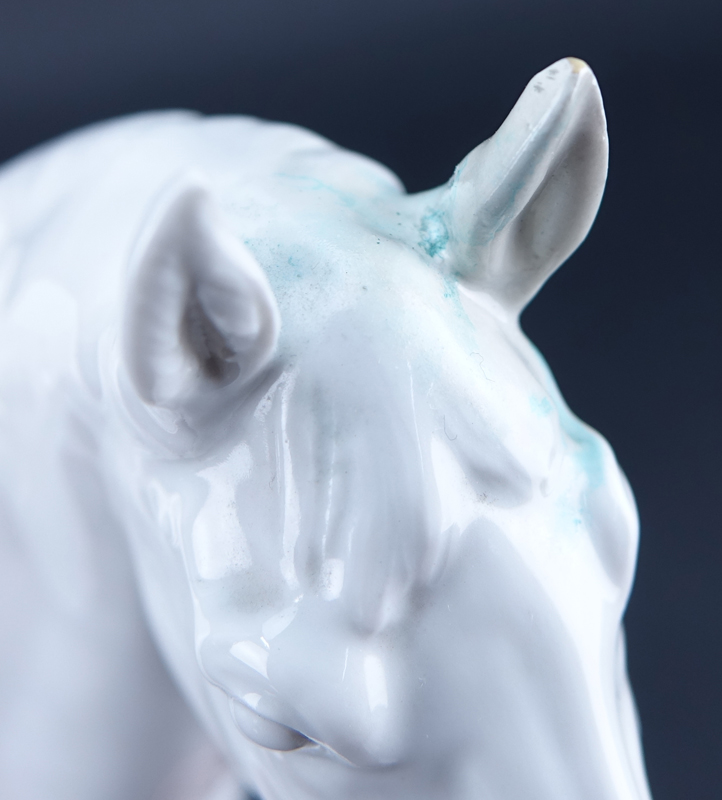 Meissen Blanc de Chine Model of a Horse Mounted on Wooden Base.