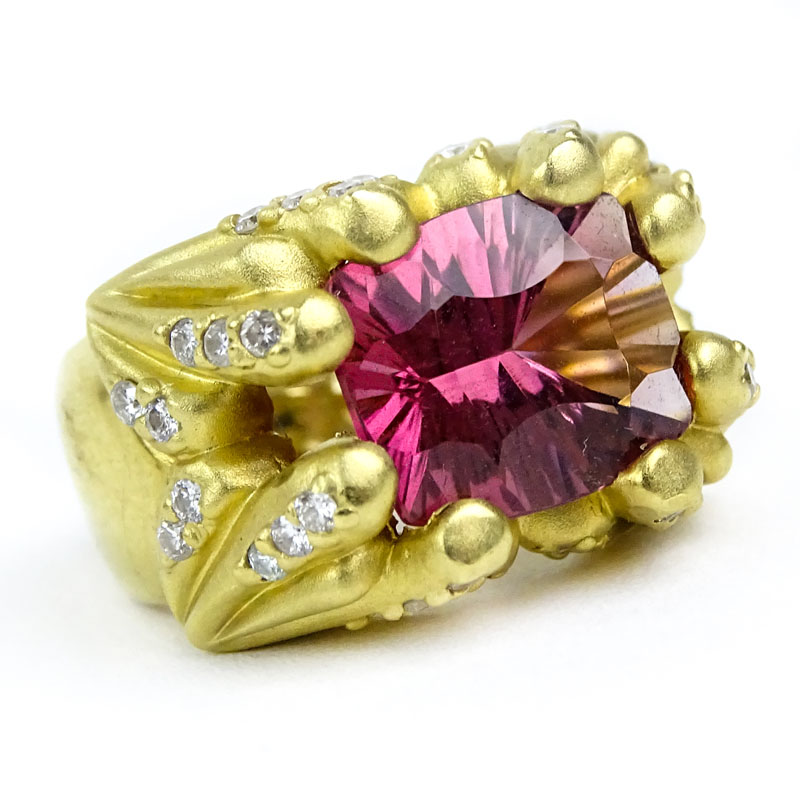 Oval Cut Salmon Pink Tourmaline, Diamond and 14 Karat Yellow Gold Ring. 