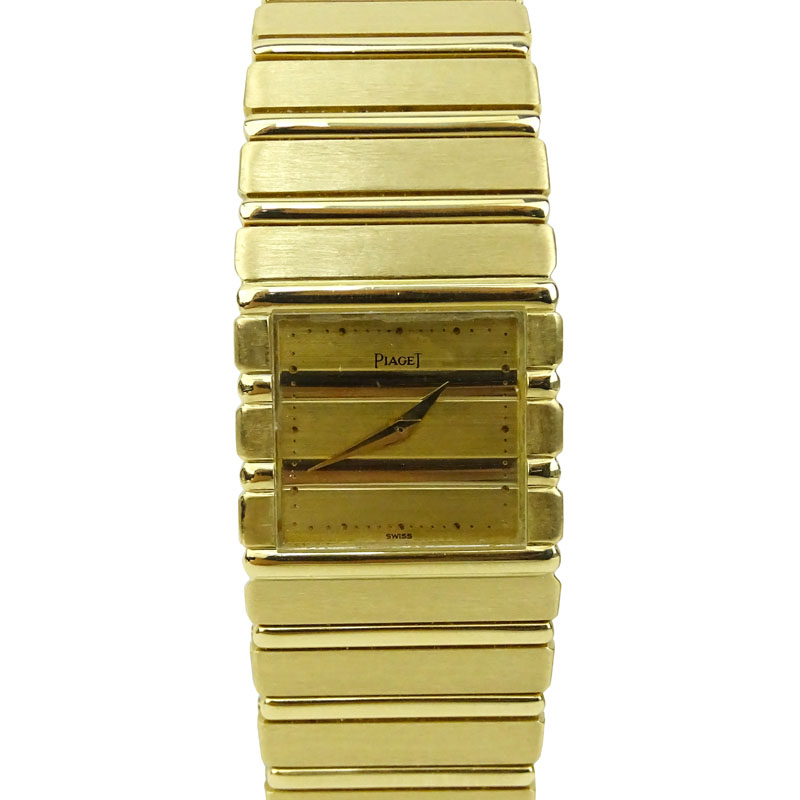 Men's Vintage Piaget Polo 18 Karat Yellow Gold Bracelet Watch with Quartz Movement 381513 with Box.