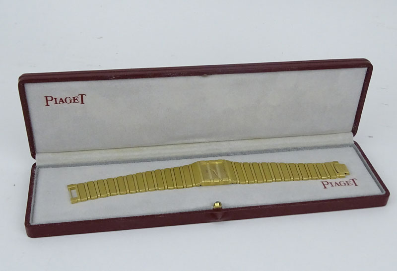 Men's Vintage Piaget Polo 18 Karat Yellow Gold Bracelet Watch with Quartz Movement 381513 with Box.