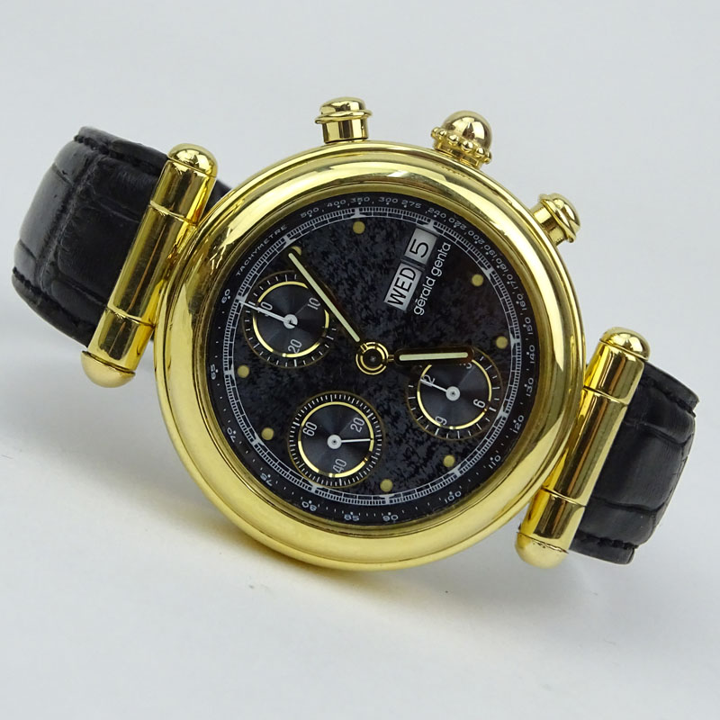 Men's Vintage Gerald Genta 18 Karat Yellow Gold Chronograph Automatic Movement Watch with Russian Meteor Dial, Crocodile Strap and 18 Karat Yellow Gold Buckle. 