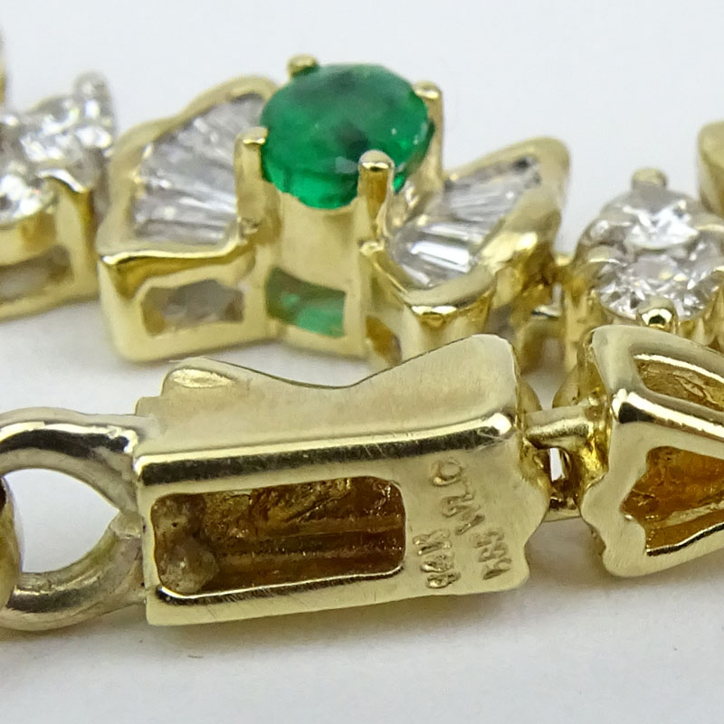 Vintage Approx. 2.20 Carat Baguette and Round Brilliant Cut Diamond, Oval Cut Emerald and 14 Karat Yellow Gold Pendant Necklace.