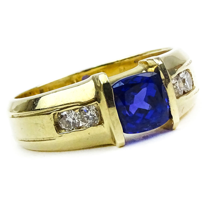 Man's Approx. 2.0 Carat Tanzanite, .55 carat Round Brilliant Cut Diamond and 14 Karat Yellow Gold Ring. 