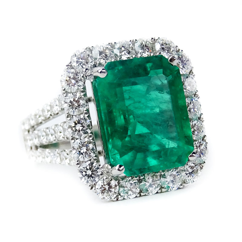 GIA Certified 7.20 Carat Colombian Emerald, 2.58 Carat Round Brilliant Cut Diamond and 18 Karat White Gold Ring.