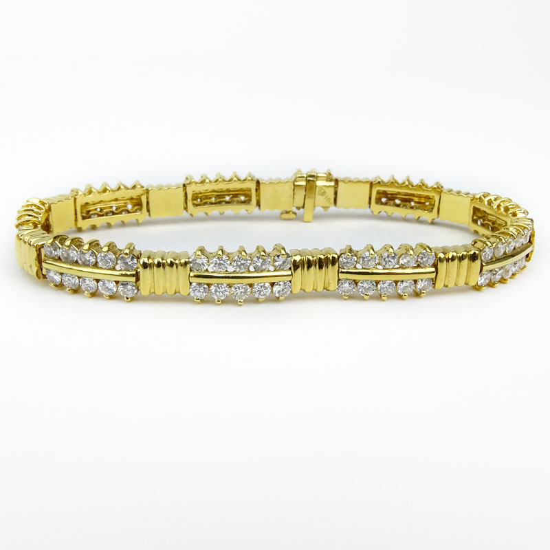 Vintage Round Brilliant Cut Diamond and 18 Karat Yellow Gold Necklace and Bracelet Suite.