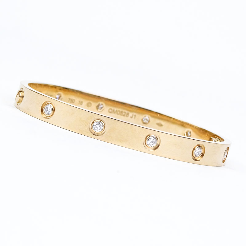 Vintage Cartier Round Brilliant Cut Diamond and 18 Karat Pink Gold Love Bracelet.