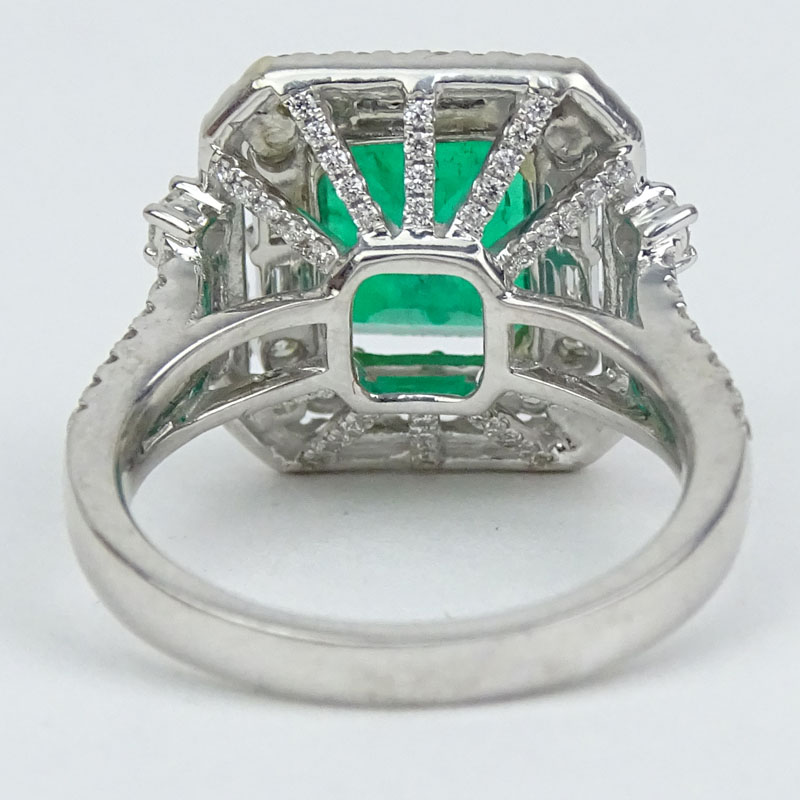 Approx. 2.50 Carat Colombian Emerald, 1.40 Carat Round Brilliant and Baguette Cut Diamond and 18 Karat White Gold Ring. 