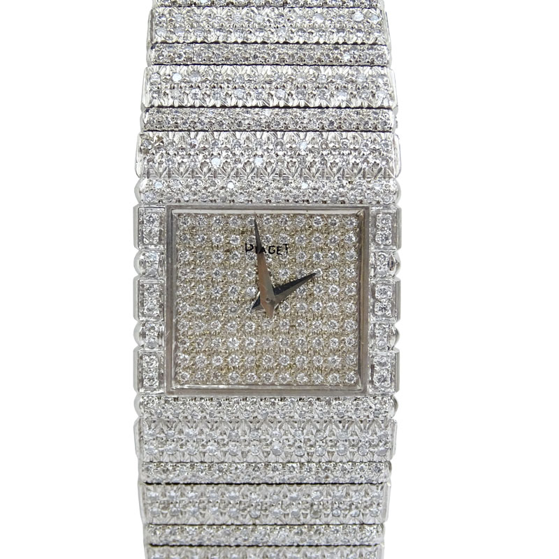 . 14.0 Carat Micro Pave Set Round Brilliant Cut Diamond and 18 Karat White Gold Bracelet Watch with Quartz Movement.