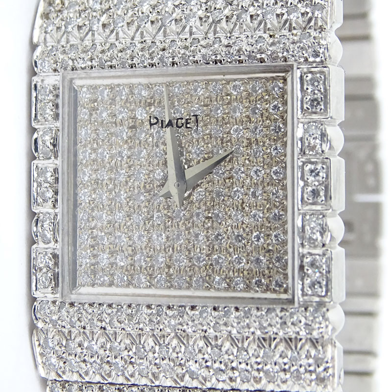 . 14.0 Carat Micro Pave Set Round Brilliant Cut Diamond and 18 Karat White Gold Bracelet Watch with Quartz Movement.