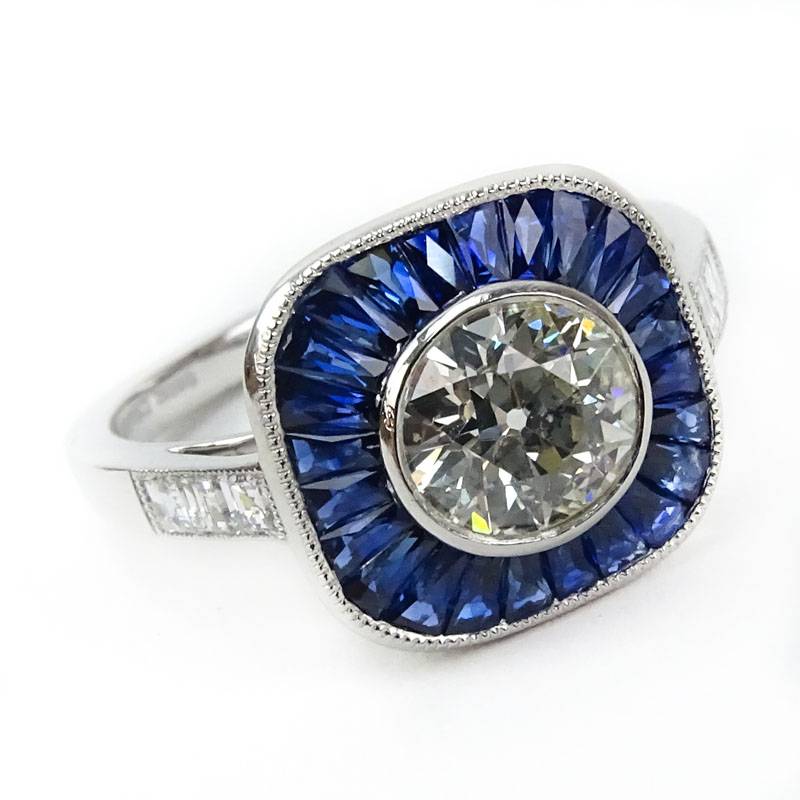 .95 Carat Old European Cut Diamond, .87 Carat Calibre Cut Sapphire and Platinum Ring.