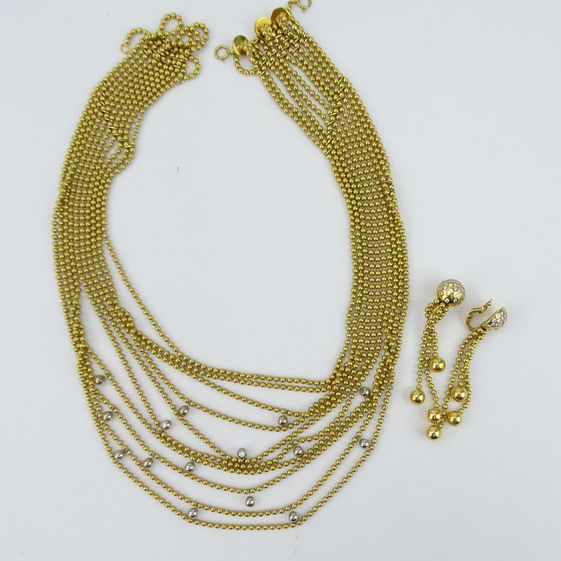 Circa 1999 Cartier Round Brilliant Cut Diamond and 18 Karat Yellow Gold Multi Strand Bead Necklace and Earring Suite