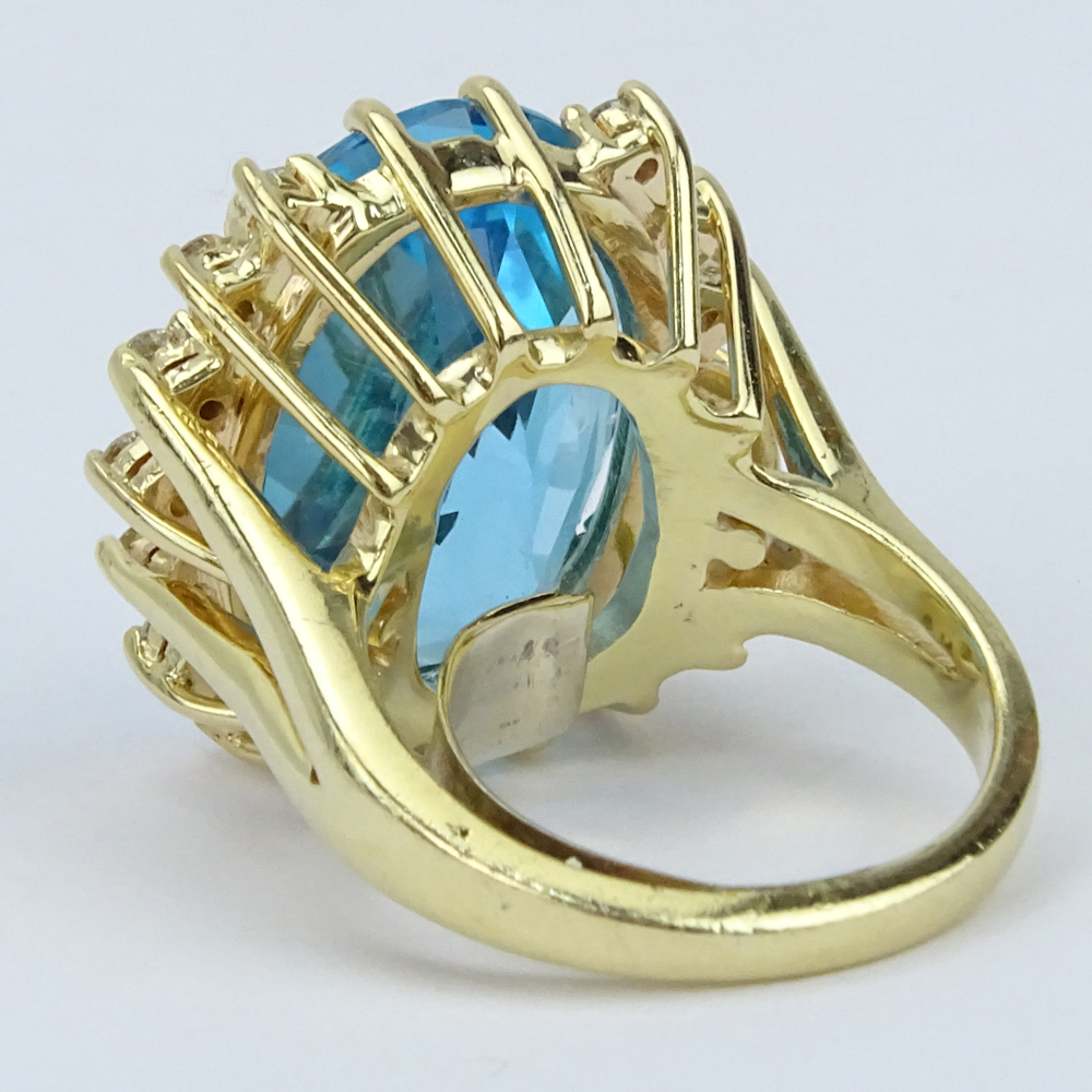 Vintage Oval Cut London Blue Sapphire, Diamond and 14 Karat Yellow Gold Ring