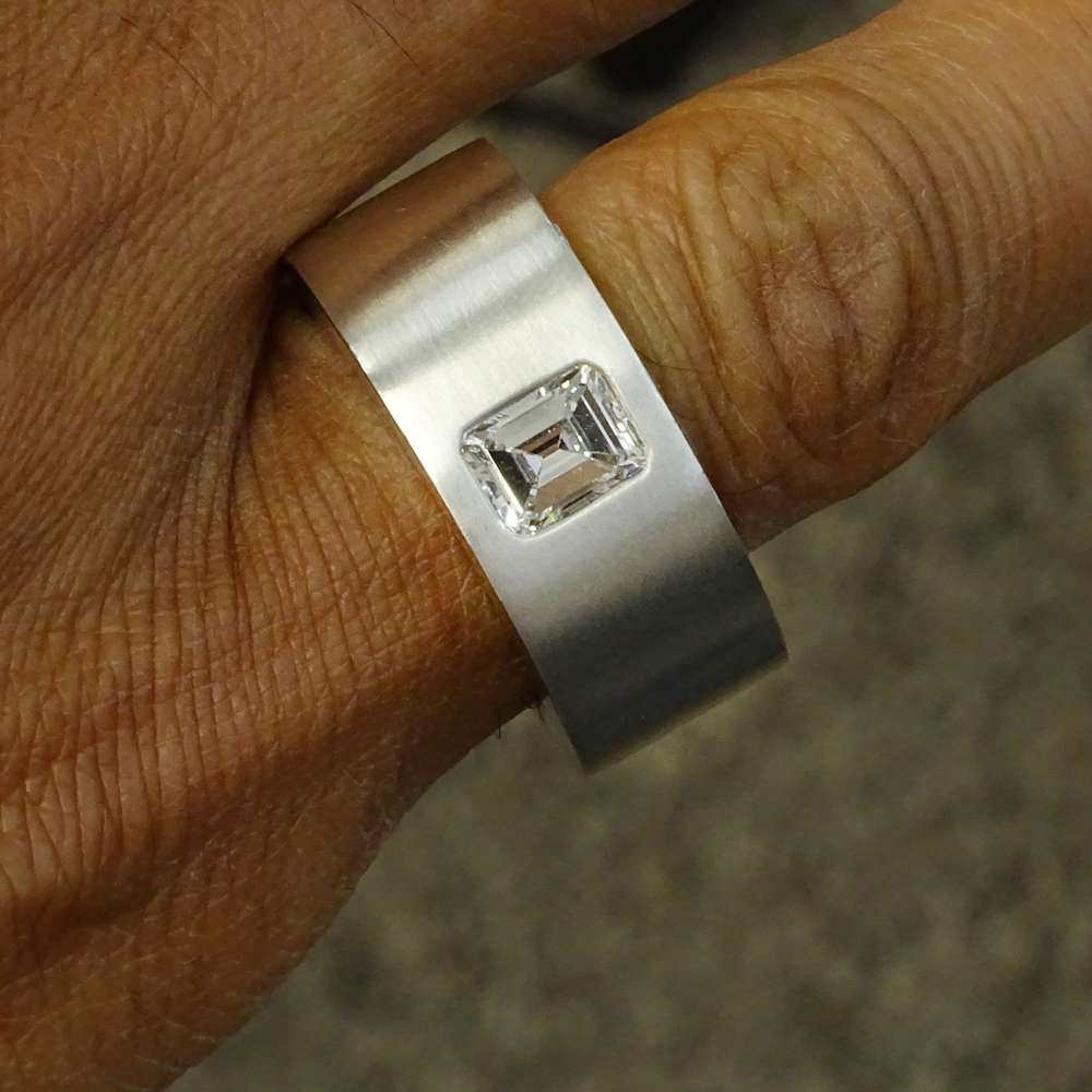 1.20 Carat Emerald Cut Diamond and Heavy Platinum Ring.