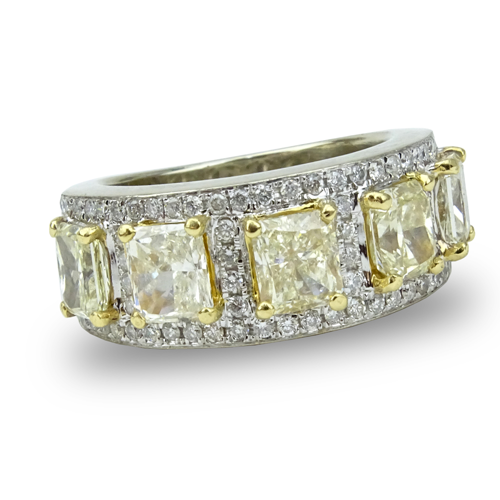  3.55 Carat Square Cut Fancy Yellow Diamond, .46 Carat Round Brilliant Cut Diamond and 18 Karat White Gold Ring.