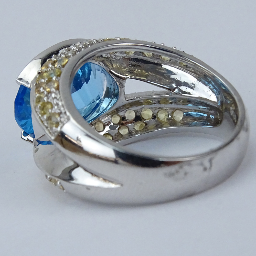 Oval Cut London Blue Topaz, Pave Set Yellow and White Diamond and 14 Karat White Gold Ring