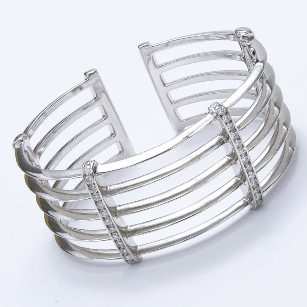 1.50 Carat Round Brilliant Cut Diamond and 18 Karat White Gold Hinged Cuff Bangle Bracelet.